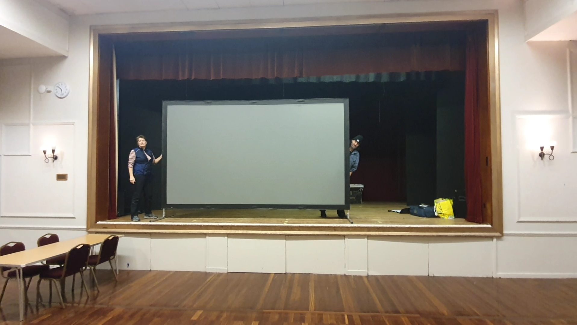 Cinema Screen being put up on Theatre Stage
